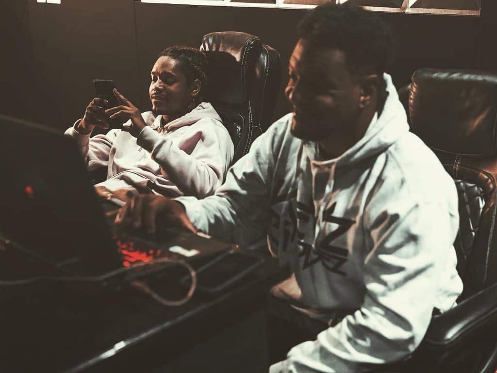 Keyz Bridgez in session with an artist at the console